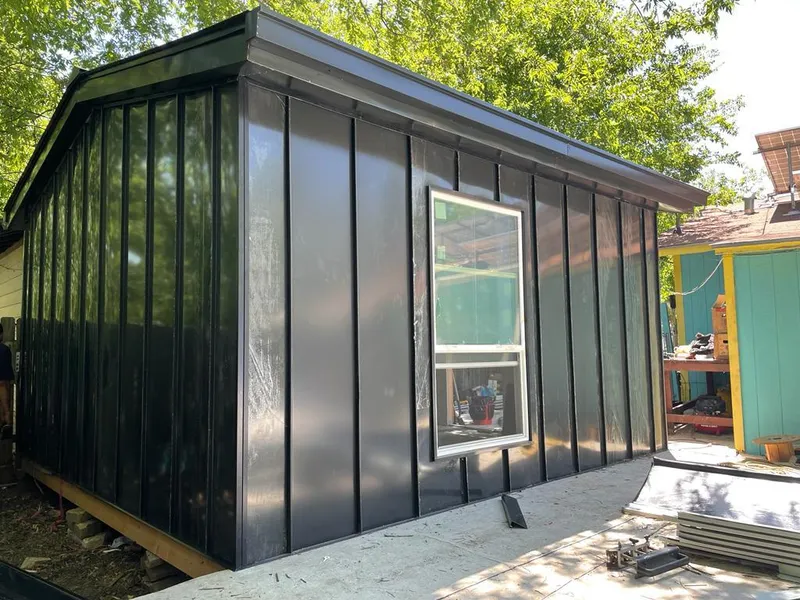 Black standing seam metal wall panels for Roof Inspection in Leesville