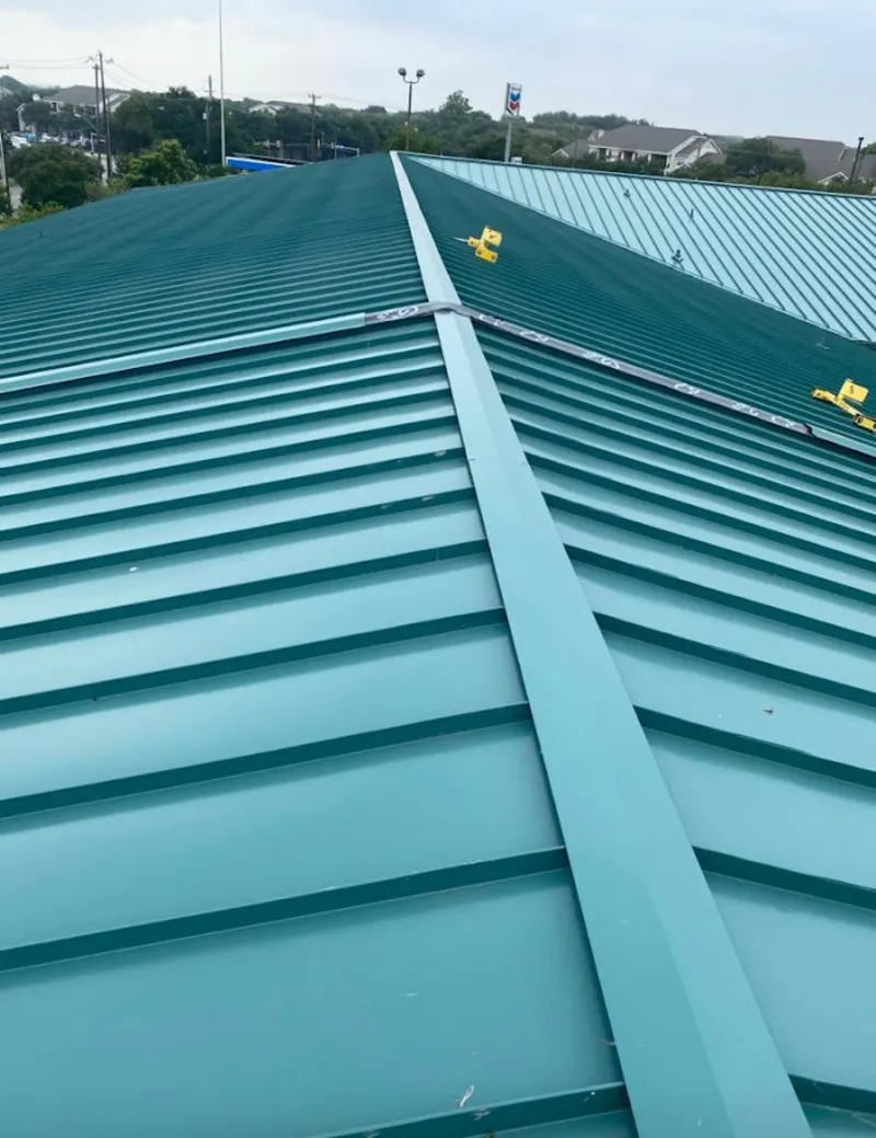 Green commercial metal roof ridge and valley for Metal Roof Repair in Leesville